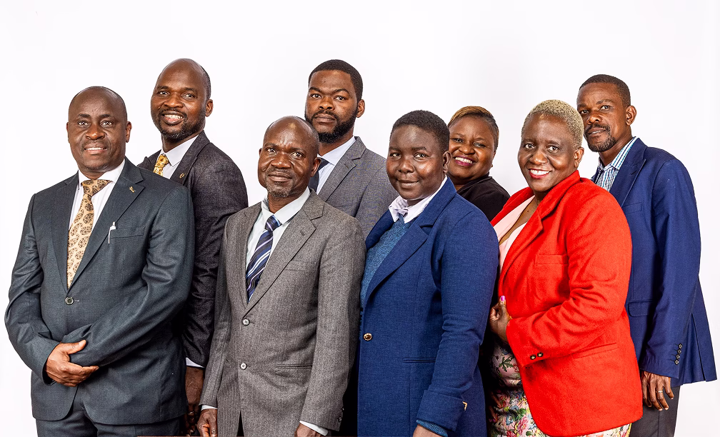 law suit (1) showing team with all employees